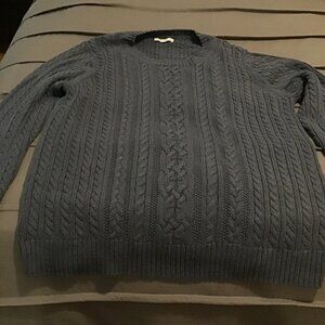 Amazon Essentials men’s knit sweater in a classic blue shade.